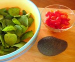 spinach, grape tomatoes and avocado