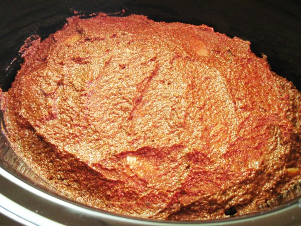 mole sauce spread over chicken