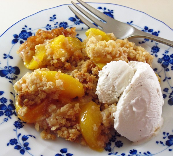 Peach crisp with ice cream
