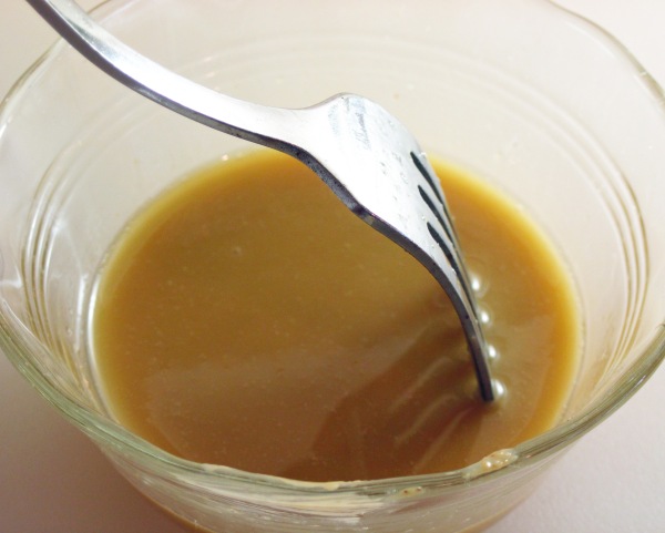 Mixing peanut butter with oil.JPG