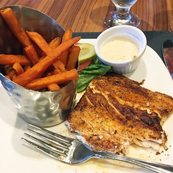Grilled mahi mahi with remoulade sauce and sweet potato fries at SPYC