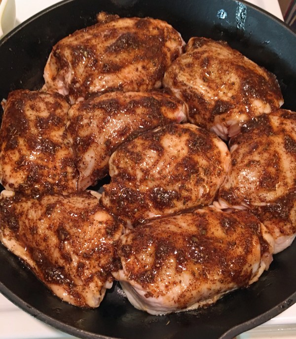 Spice mixture rubbed all over the chicken