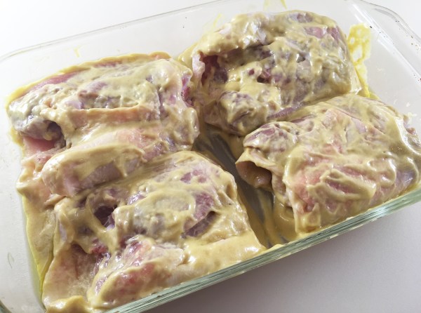 Chicken thighs marinating