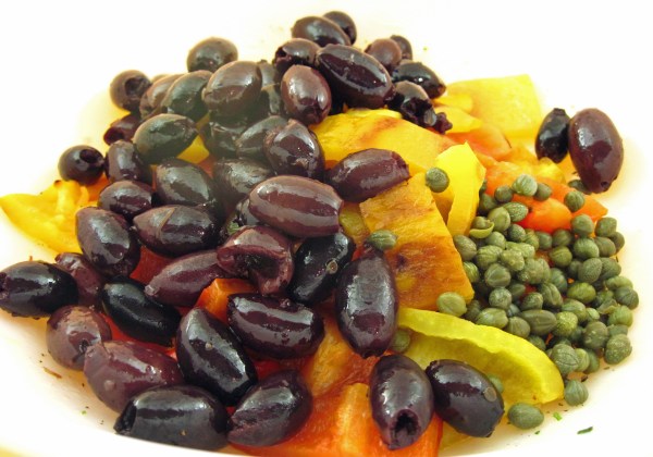 Peppers, olives, and capers in the bowl