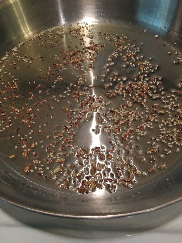 Fennel seeds, cumin seeds, and sesame seeds
