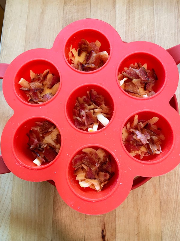 cheese and bacon in the cups