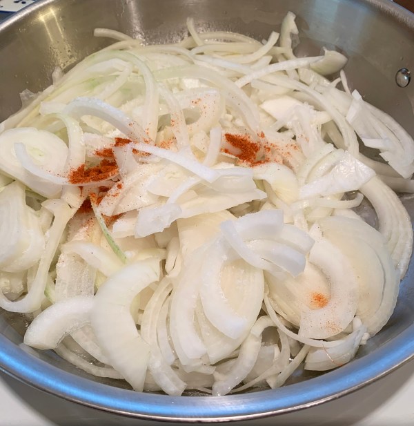 Onions and seasonings in a bowl